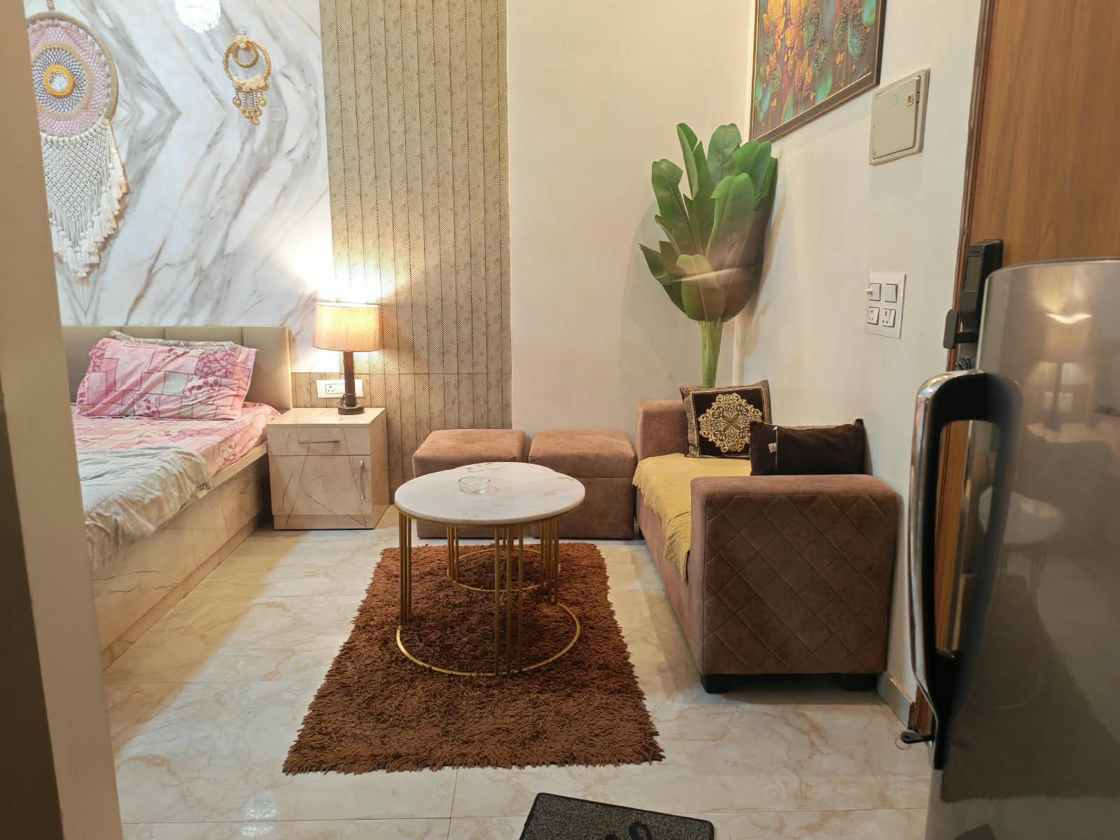 A comfortable bedroom with a welcoming seating area
